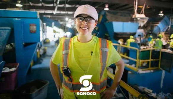 Woman at recycling plant