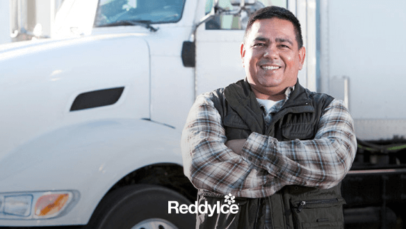 Man standing in front of truck