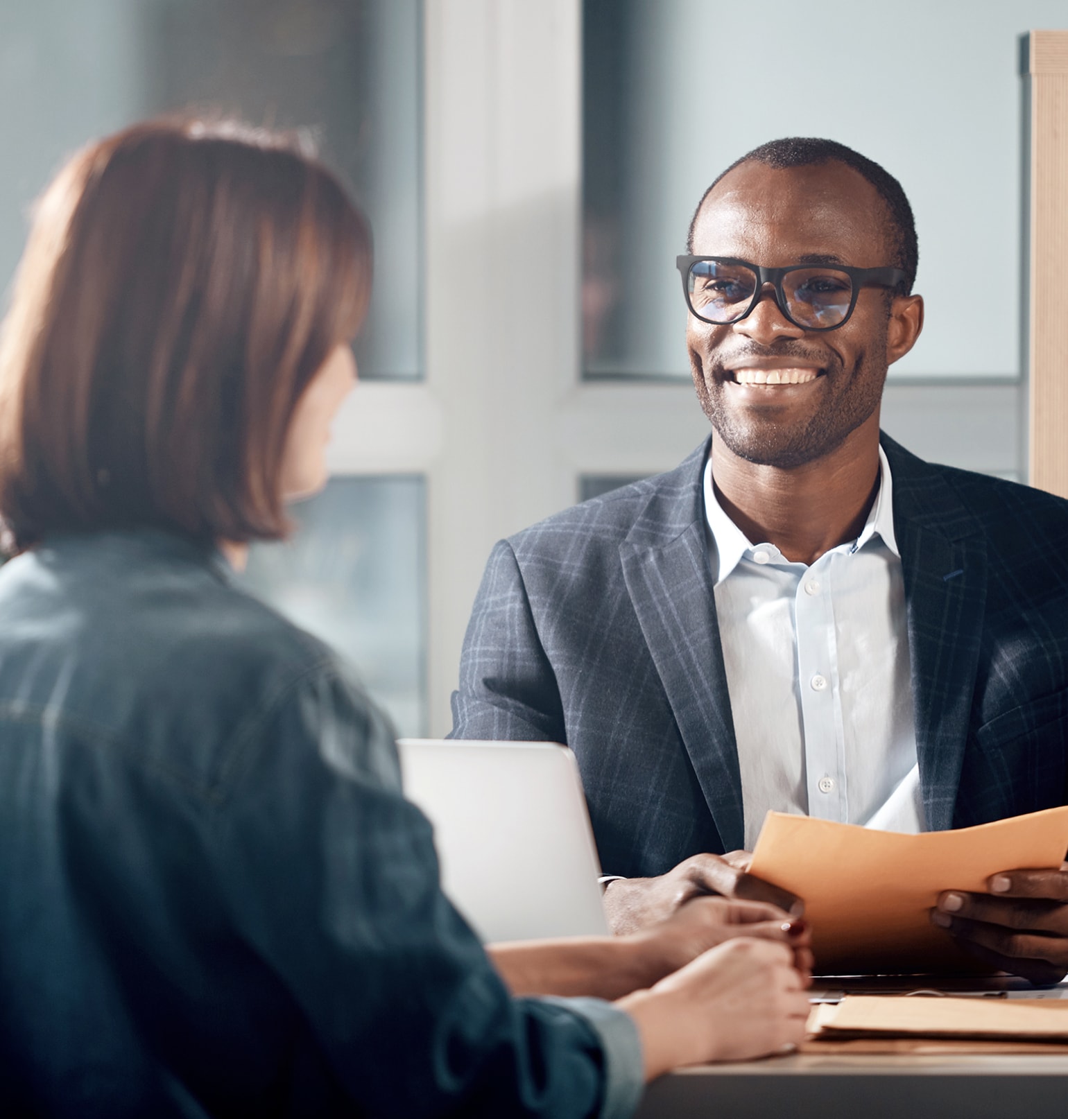 Man and woman at desk