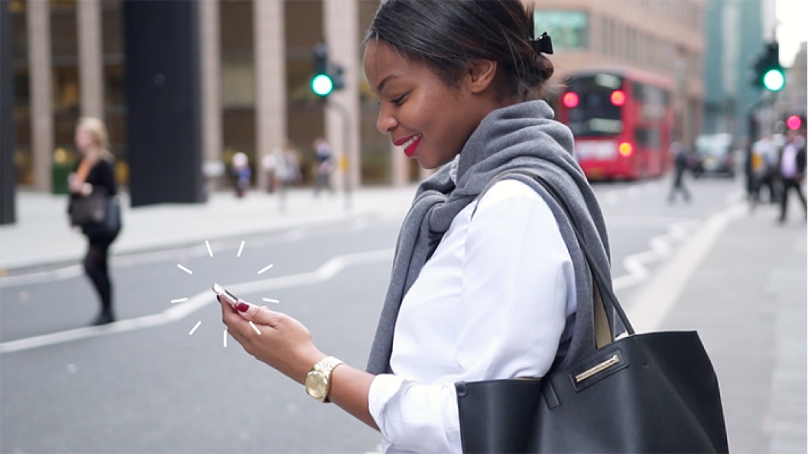 Woman looking at phone.