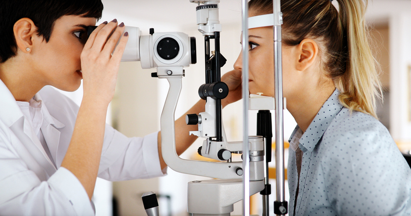 An Optometrist in Singapore Examining a Patient's Eyes