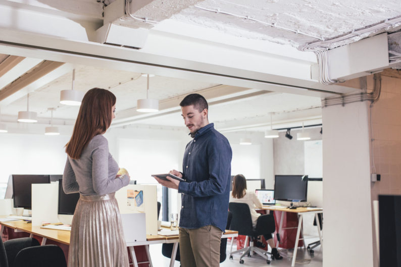 A woman interviews a previous felon for a job