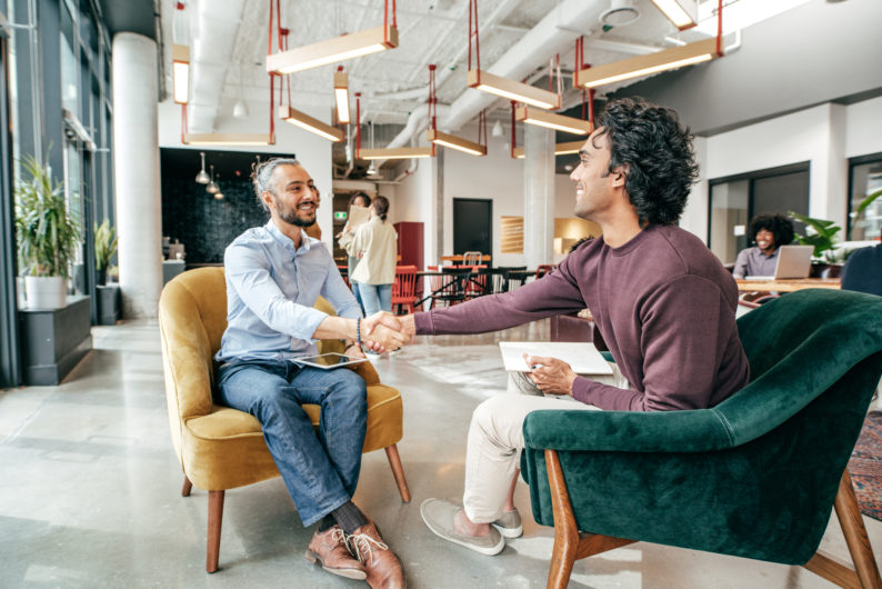 Job seeker and interviewer discuss compensation