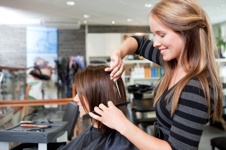 Miami hairstylist straightens detangles hair and clients lives at her  Little Havana salon